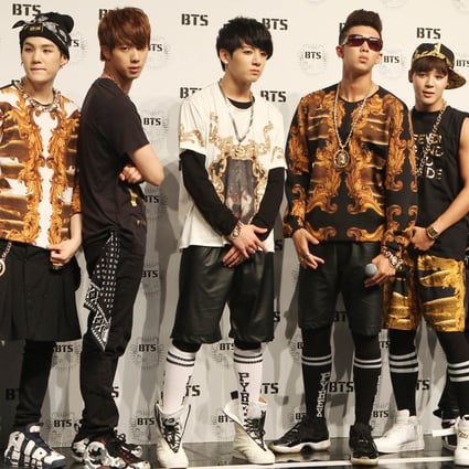 BTS during their showcase in 2013. The South Korean boy band have gone from streetwear to tailored suits and Louis Vuitton. Photo: Getty Images