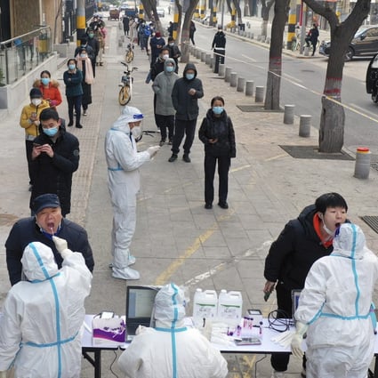Residents queue for Covid-19 tests in Xian, which has been under a strict lockdown for nearly a fortnight. Photo: AP