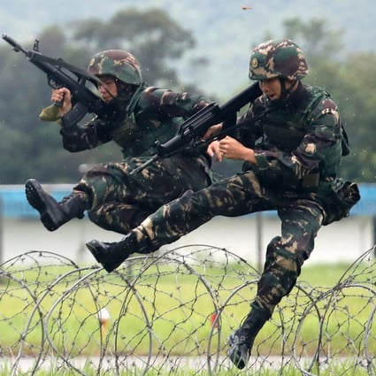 PLA soldiers demonstrate their skills and technique during an open day in 2019. Photo: Xiaomei Chen