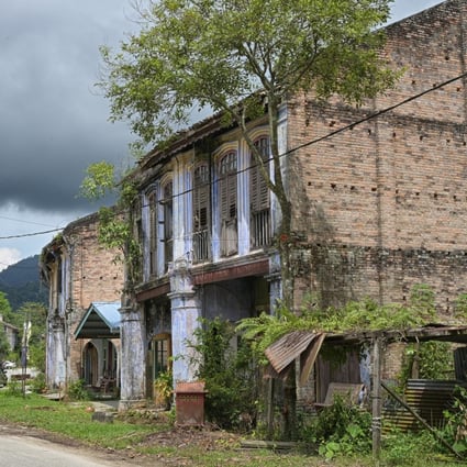 Crumbling heritage houses in Papan, Malaysia. The former tin mining town is at the centre of a struggle between residents who’d like to turn it into a tourist attraction and those who’d prefer to leave just how it is. Photo: Philippe Durant
