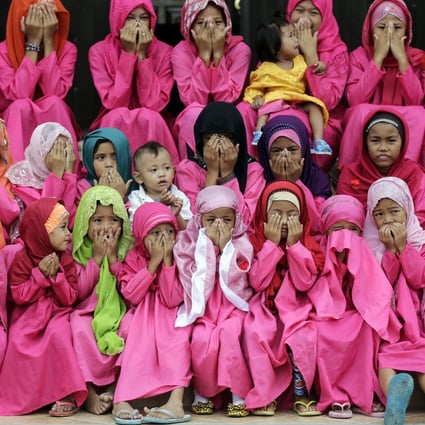 Filipino Muslim girls may still marry under new law, but only for one more year. Photo: EPA