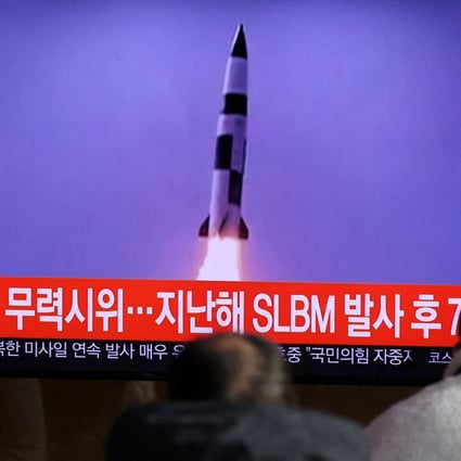 People in Seoul on Wednesday watch a screen showing file footage of a North Korean missile launch. Photo: Reuters