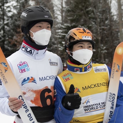 Sun Jiaxu (left) and Xu Mengtao celebrate their victories at the World Cup freestyle skiing event in Quebec. Photo: AP