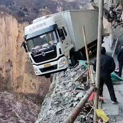 Quirky CHina: A truck was left literally hanging on a mountain side after an accident and tourists are buying hot water to throw into cold air to watch it freeze. Photo: SCMP artwork