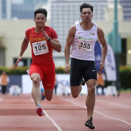 Ng Ka-fung (right) runs against Su Bingtian in the 100 metres at the 2018 Hong Kong Championships at the Wan Chai Sports Ground. Photo: Sam Tsang