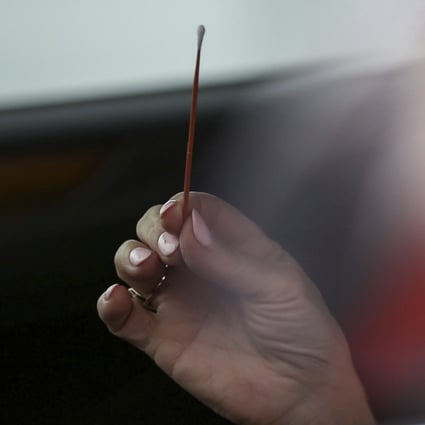 Covid-19 swab tests are conducted at a stadium in Houston in December. Photo: Houston Chronicle via AP