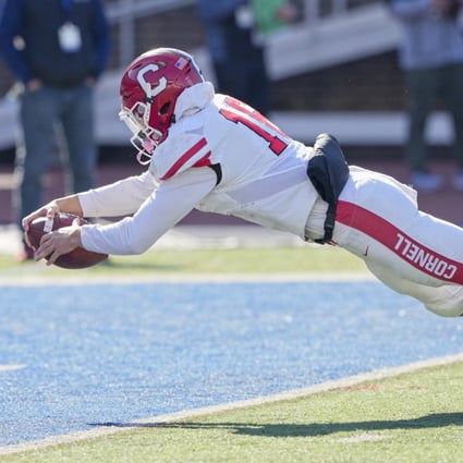 Cornell Big Red quarterback Jameson Wang (16) dives for a touchdown. Wang could be one of the first Chinese-American quarterbacks to play in the NFL. Photo: Getty Images