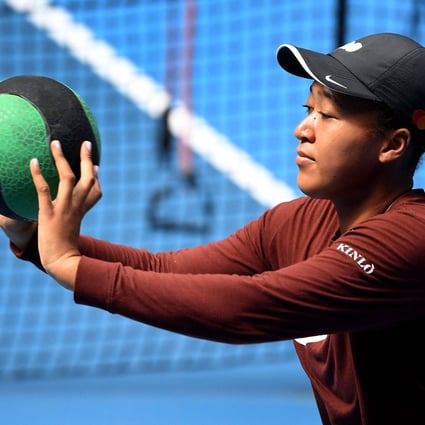 Naomi Osaka trains during the Melbourne Summer Set tournament but was forced to pull out before the semi-finals. Photo: AFP