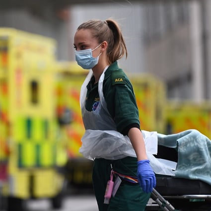 NHS ambulance staff outside the Royal London hospital in London, Britain on January 6. Photo: EPA-EFE