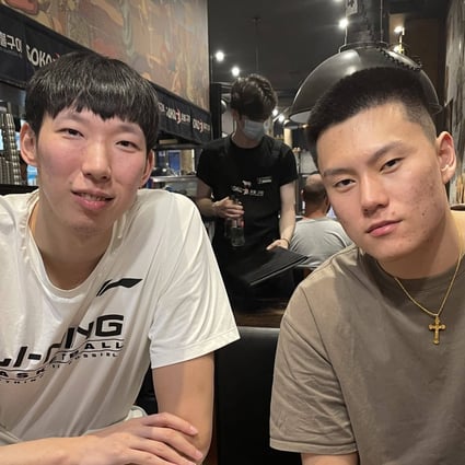 South East Melbourne Phoenix’s Chinese basketball players Zhou Qi (left) and Ben Li at dinner in Melbourne. Photo: Handout   