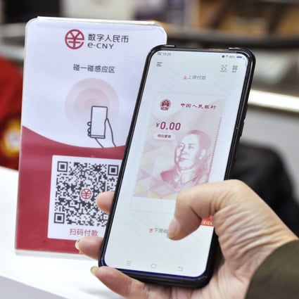 A Suzhou resident uses the e-CNY smartphone app during a trial on December 14, 2020. Photo: Kyodo