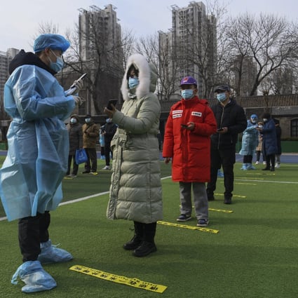 A woman registers for a Covid-19 test in Tianjin on Sunday, as the northern city began mass testing its 14 million residents. Photo: Xinhua