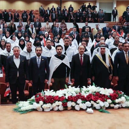 Members of Iraq’s new parliament before holding an inaugural session in the capital Baghdad on January 9. Photo: Iraqi Parliament Press Office / AFP
