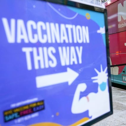 A man leaves a vaccination bus at a mobile clinic in New York in December. Photo: AP