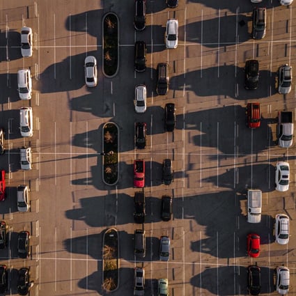 People in cars queue at a drive-through Covid-19 testing site in Louisville, Kentucky. Photo: AFP