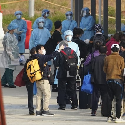People arrive at the Penny’s Bay Quarantine Centre on Lantau Island for quarantine. Photo: Felix Wong