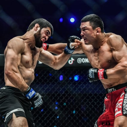 ‘Dagi’ Arslanaliev (left) and Timofey Nastyukhin exchange punches at ONE: Winter Warriors