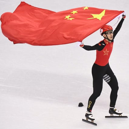 Wu Dajing celebrates victory after men’s 500m final of short track speed skating at the 2018 Pyeongchang Winter Olympic Games at Gangneung Ice Arena, South Korea. Photo: Xinhua