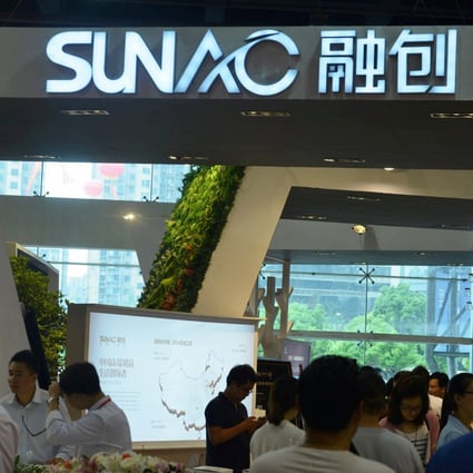 Sunac China Holdings’ logo at an exhibition in Hangzhou on May 25, 2015. Photo: China Daily/via Reuters
