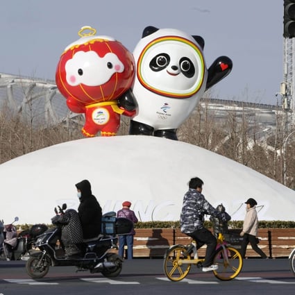 An installation featuring Beijing Winter Olympic mascot Bing Dwen Dwen (R) and Paralympic mascot Shuey Rhon Rhon is seen near the National Stadium in Beijing on Wednesday. Photo: Kyodo