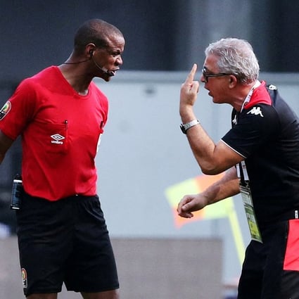Tunisia coach Mondher Kebaier remonstrates with the referee Janny Sikazwe after Tunisia’s match with Mali at the Africa Cup of Nations. Photo: Reuters