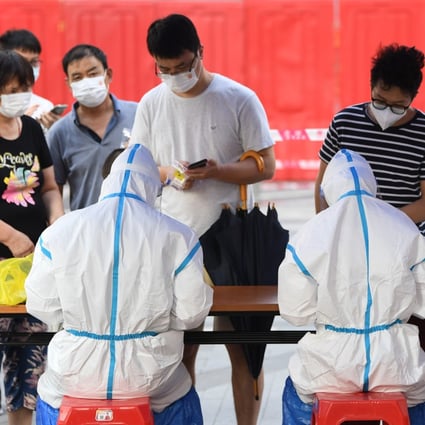 People line up for Covid-19 testing in Guangzhou, Guangdong Province. China’s health care sector was a hot spot for start-up funding in 2021. Photo: Xinhua