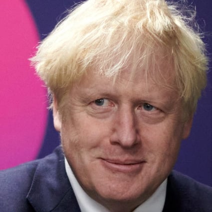 Britain’s Prime Minister Boris Johnson visits the headquarters of Octopus Energy in London in October 2020. Photo: Reuters