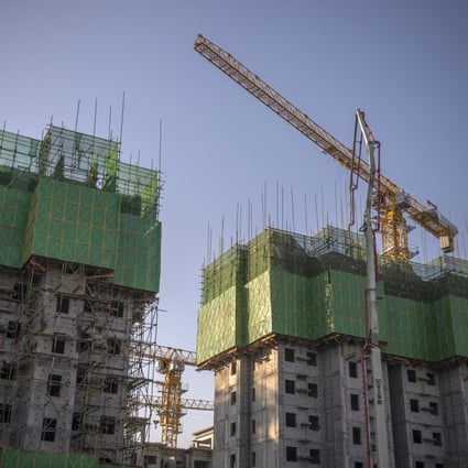 Unfinished apartment buildings at the construction site of a China Evergrande Group development in Beijing on January 6, 2021.  Photo: Bloomberg