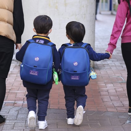 Kindergarten students in Hong Kong’s Quarry Bay district on January 11. Kindergarten and primary school students have been taken out of in-person classes again, posing further risk to their academic achievement, social development and mental and emotional health. Photo: Nora Tam