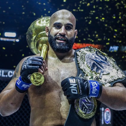 Arjan Bhullar celebrates with the ONE heavyweight title. Photo: Dux Carvajal/ONE Championship