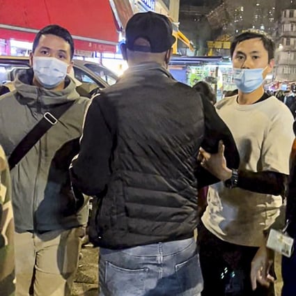 Plain-clothes customs officers are seen arresting a South Asian man in Sham Shui Po in a now-viral video posted online. Photo: Facebook