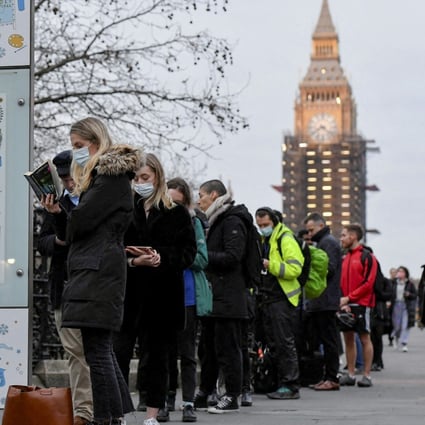 People queue for Covid-19 vaccines in London. Hong Kong students living in the UK have found themselves taken aback by the country’s comparatively lax approach to the pandemic. Photo: Reuters