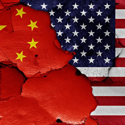 Flags of China and USA painted on cracked wall. Photo Shutterstock