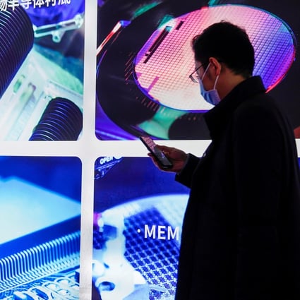 A man views a display at the Semicon China exhibition, March 17, 2021. Photo: Reuters