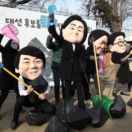 Environmental activists wearing masks of South Korea’s four major presidential candidates. Photo: EPA