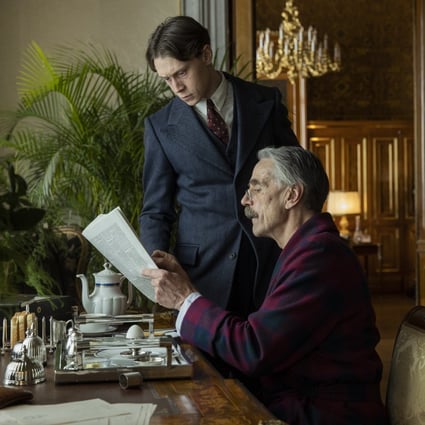 George MacKay (top) as Hugh Legat and Jeremy Irons as Neville Chamberlain in a still from Munich: The Edge of War. Photo: Frederic Batier/Netflix.