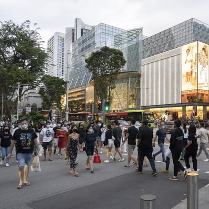 Shoppers on Orchard Road in Singapore. The city state’s central bank said it expects core inflation to be 2.0–3.0 per cent this year. Photo: Bloomberg