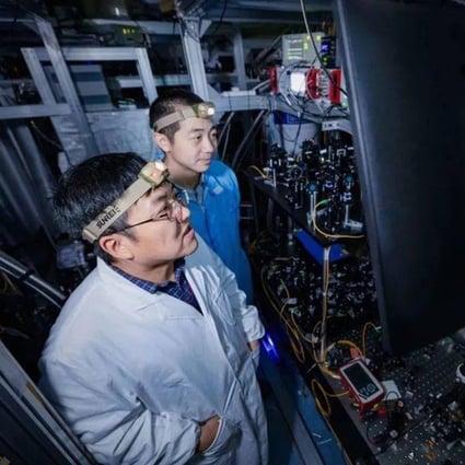Quantum physicist Zhou Zongquan (right) says he believes a code-breaking quantum computer will be gradually developed. Photo: University of Science and Technology of China