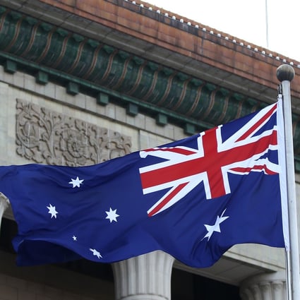 An Australian flag outside the Great Hall of the People in Beijing. Photo: Getty Images