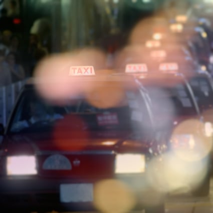 Taxis are seen on a road in Hong Kong. Photo: Shutterstock 