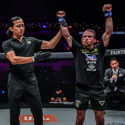 Jarred Brooks is announced as the winner against Hiroba Minowa. Photos: ONE Championship
