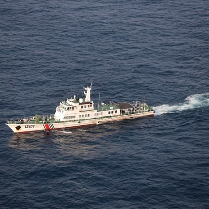 A Chinese coastguard ship cruising near disputed islands known by China as the Diaoyus and by Japan as the Senkakus. Photo: EPA