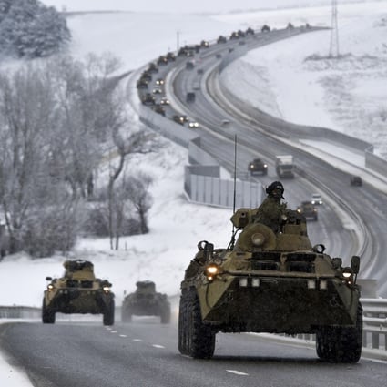 A convoy of Russian armoured vehicles moves along a highway in Crimea. File photo: AP
