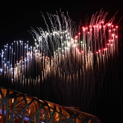 Fireworks in the shape of the Olympic rings light up the sky above the National Stadium at the end of the opening ceremony of the Beijing 2022 Winter Olympic Games in Beijing. Photo: AFP
