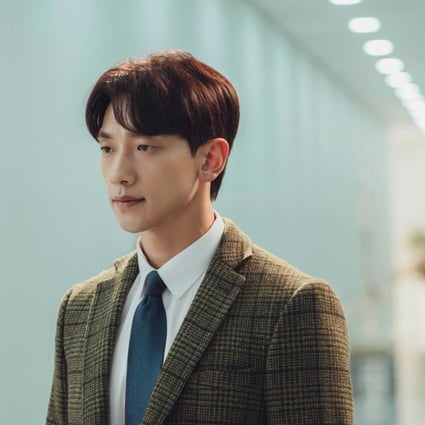 Rain in a still from Ghost Doctor. He convinces as a surgeon in a coma who lends an intern (Kim Beom) his “golden hands” to save lives in the OR. 
