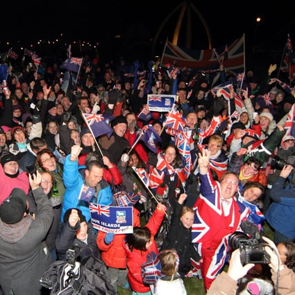 Falkland Islanders celebrate the result of a referendum in 2013, which overwhelmingly supported remaining British, despite Argentina’s sovereignty claims. Photo: AFP