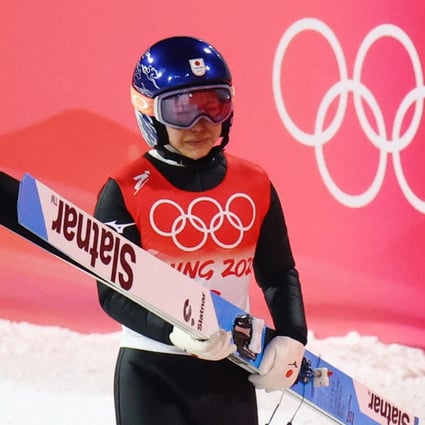Sara Takanashi of Japan reacts during the ski jump mixed team final round at the Beijing 2022 Olympic Games. Photo: Reuters/Hannah Mckay
