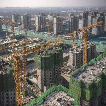 Unfinished apartment buildings at a China Evergrande construction site in Beijing. Photo: Bloomberg