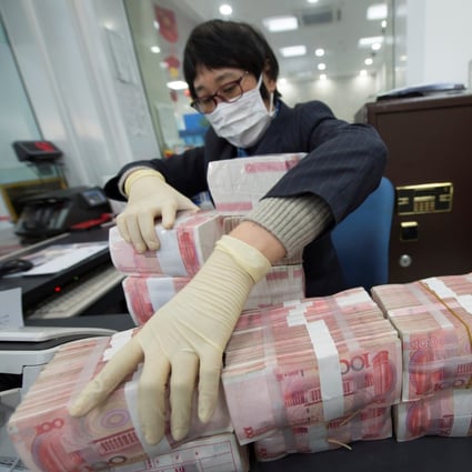 Last month, banks extended a record monthly high of 3.98 trillion yuan (US$626 billion), a year-on-year increase of 11.5 per cent, the People’s Bank of China (PBOC) said on Thursday, and up from 1.13 trillion yuan in December. Photo: Reuters