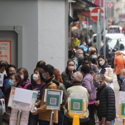 People waiting outside a community vaccination centre in Hong Kong last week. Photo: Reuters